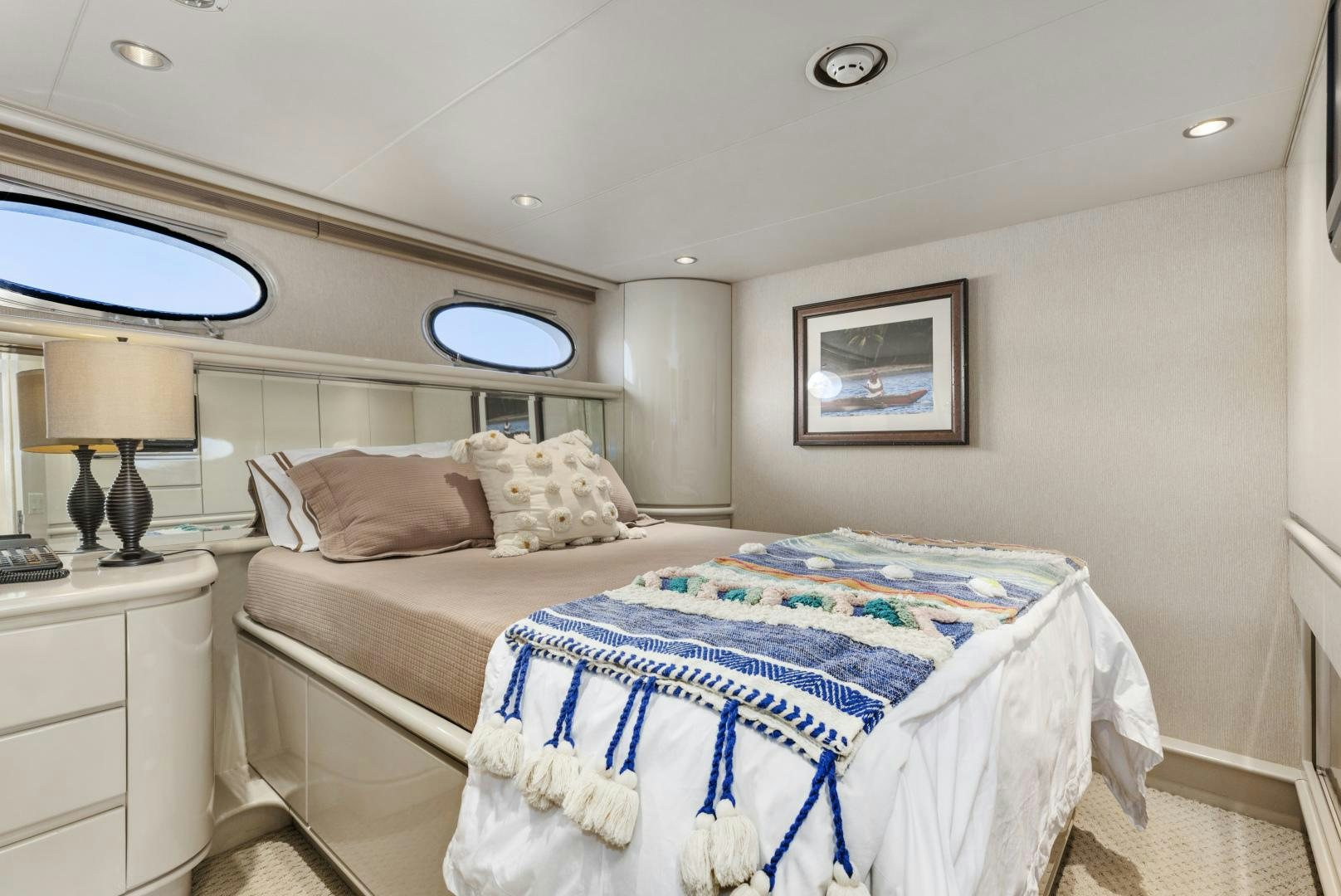 a bedroom with two beds aboard AQUILA Yacht for Sale