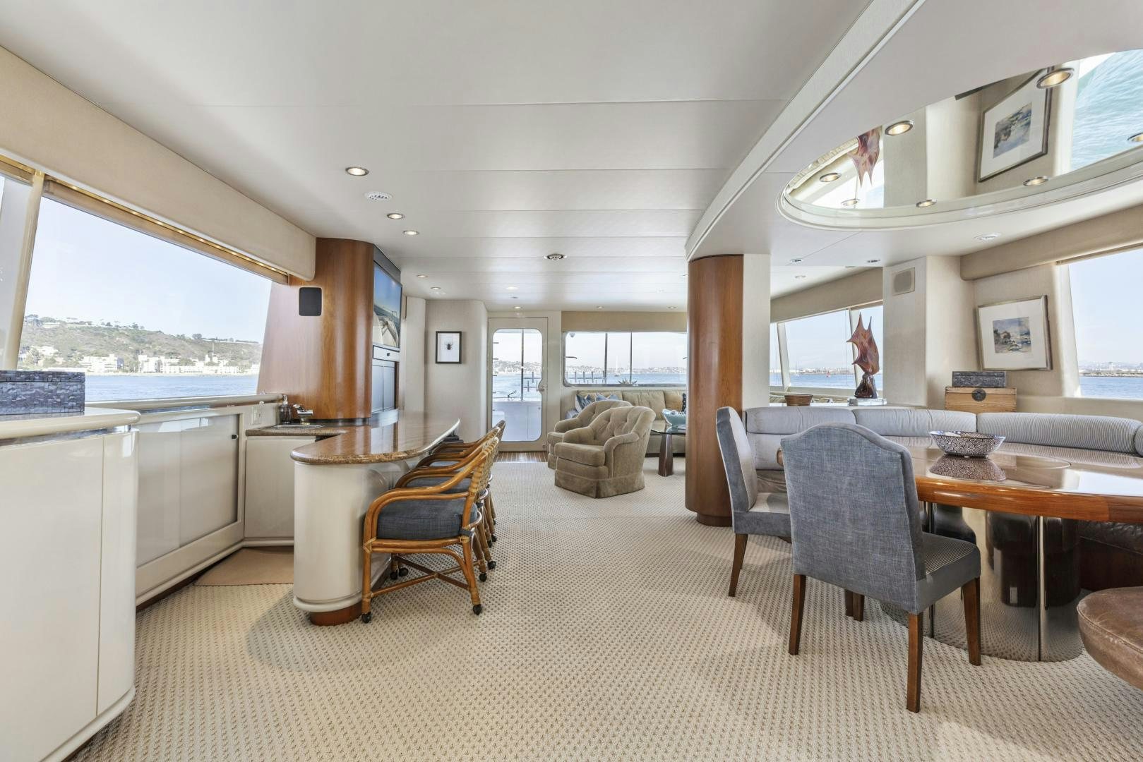 a large kitchen and dining area aboard AQUILA Yacht for Sale