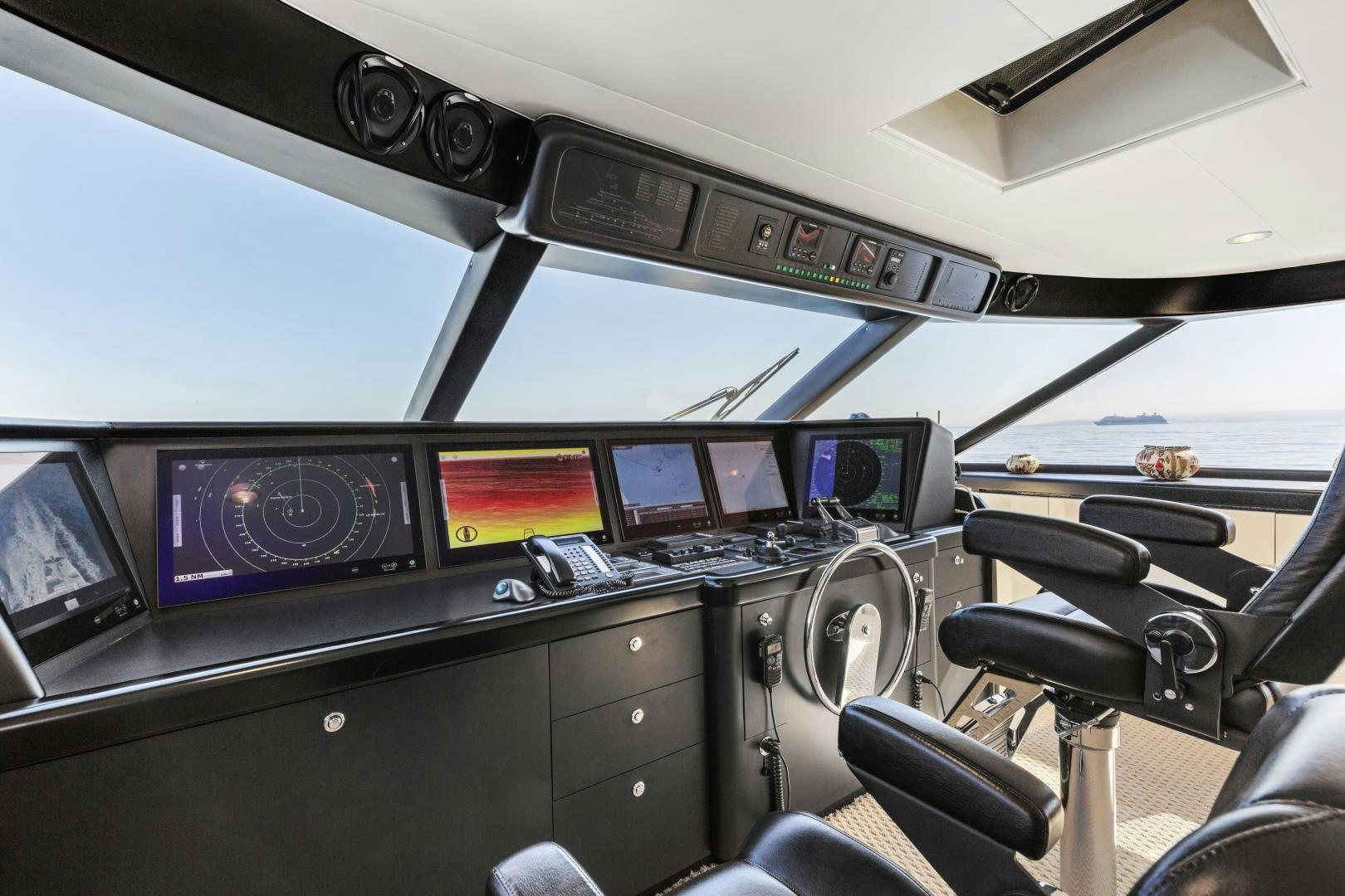 inside of a car aboard AQUILA Yacht for Sale