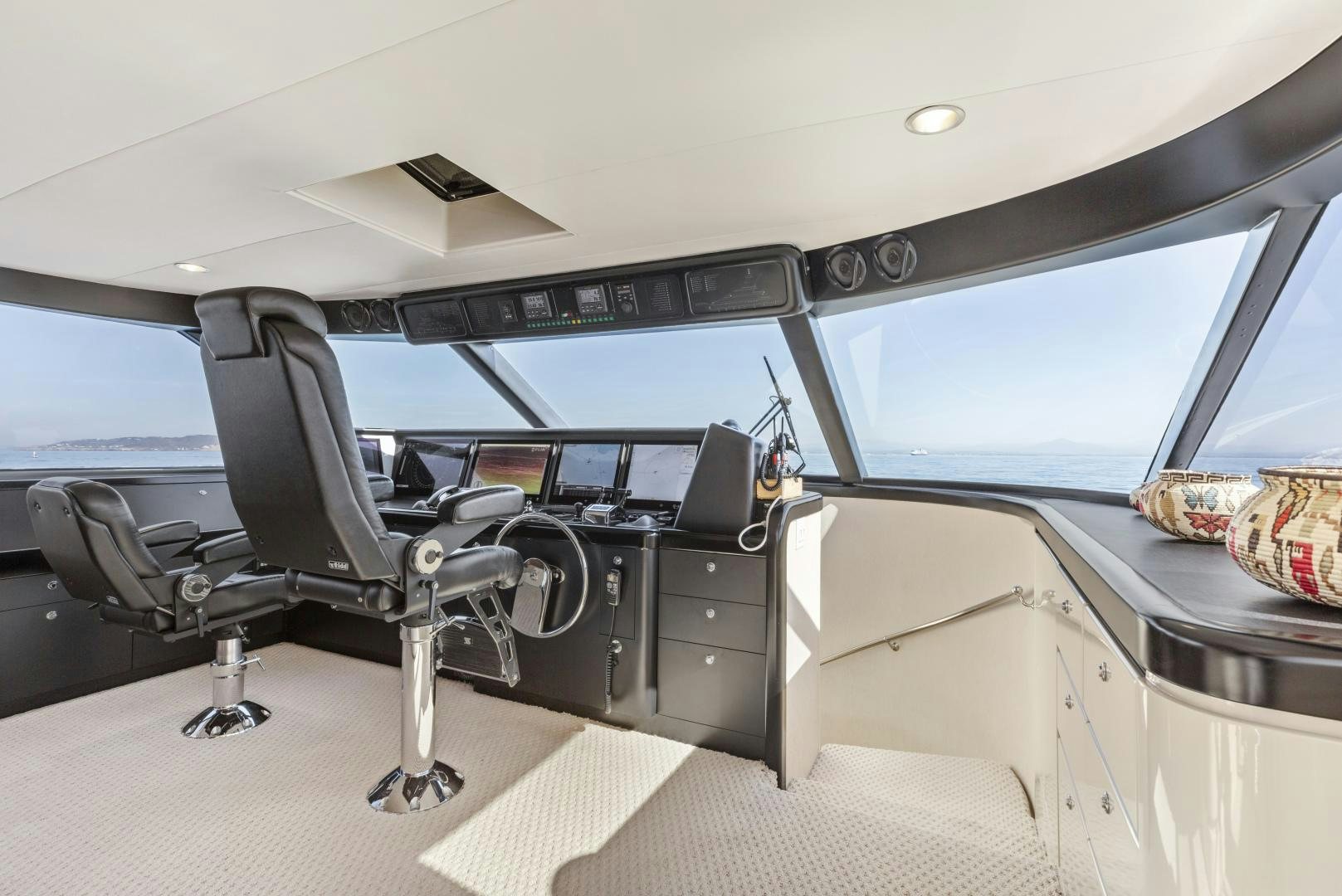inside of a car aboard AQUILA Yacht for Sale
