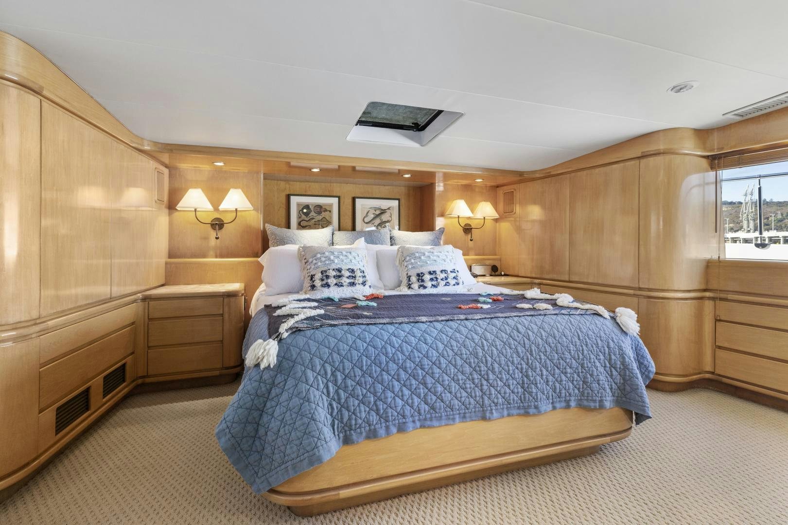 a bed in a room aboard AQUILA Yacht for Sale
