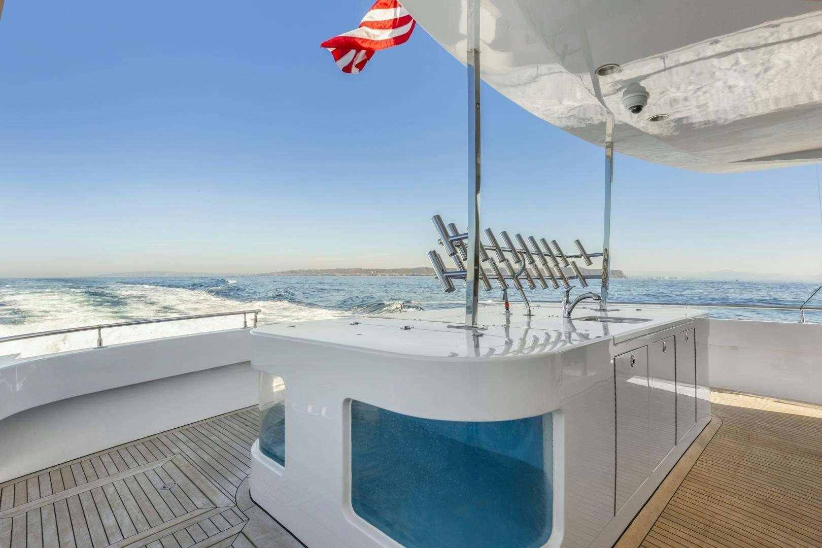 a flag on a boat aboard AQUILA Yacht for Sale