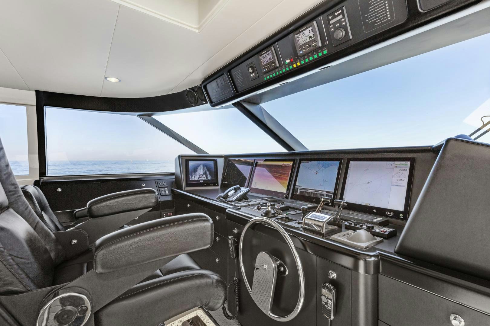 inside of a car aboard AQUILA Yacht for Sale