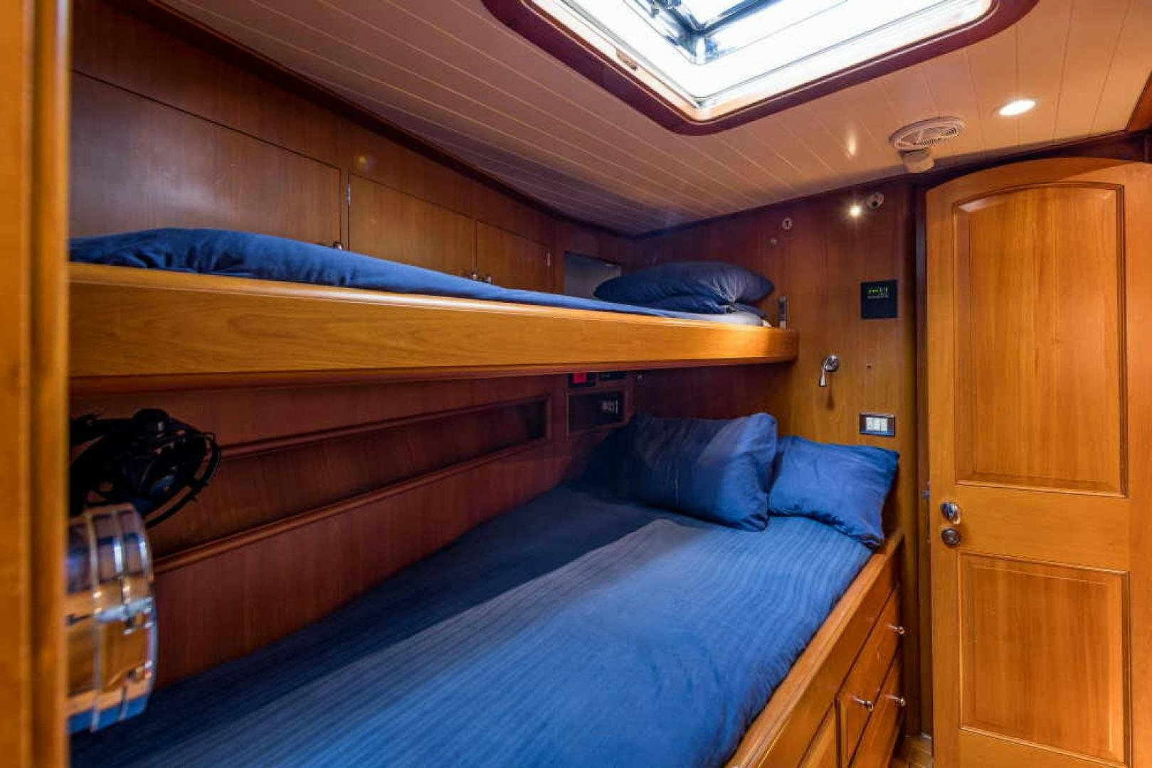 a room with bunk beds aboard BLUE TOO Yacht for Sale