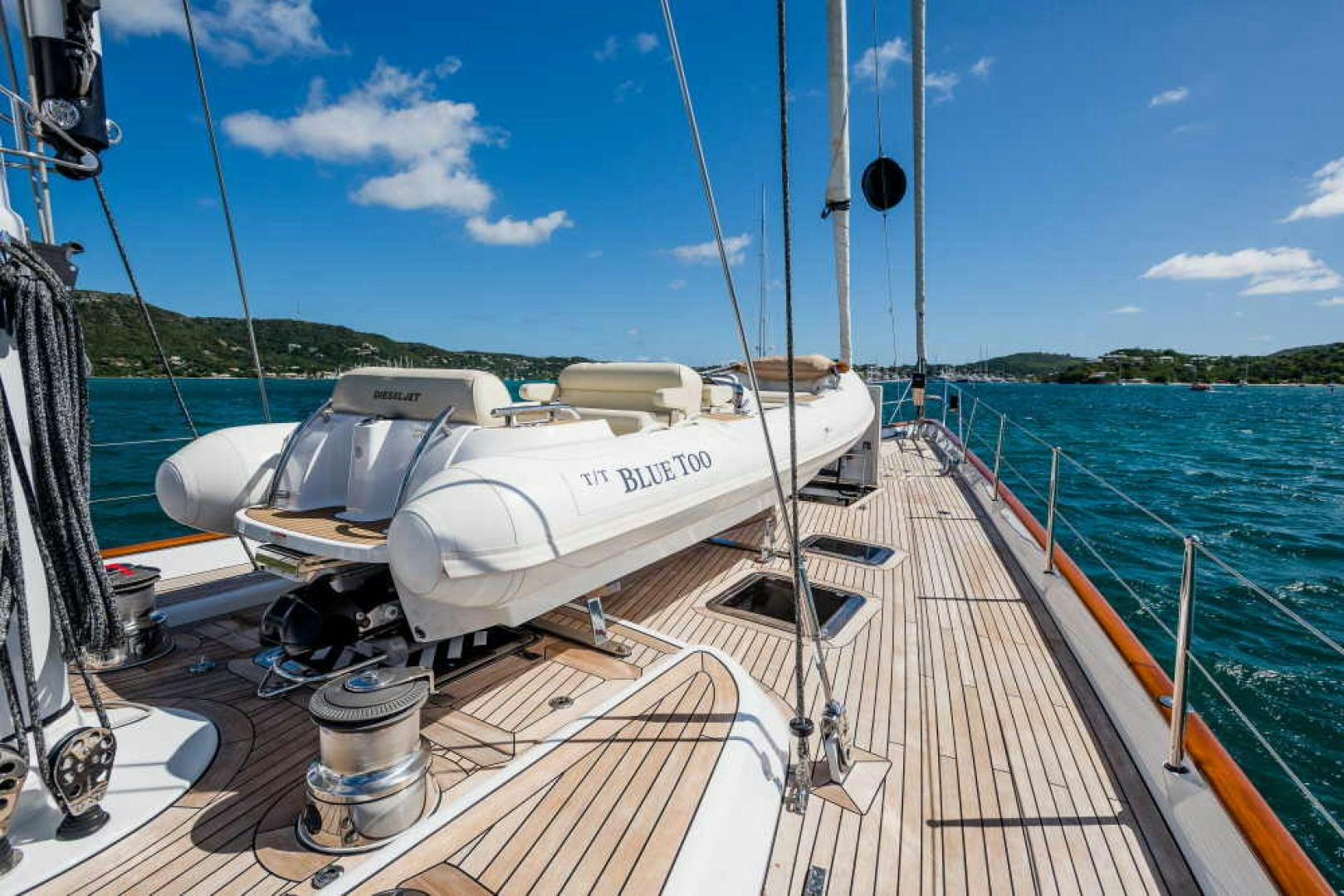 a boat on a deck aboard BLUE TOO Yacht for Sale
