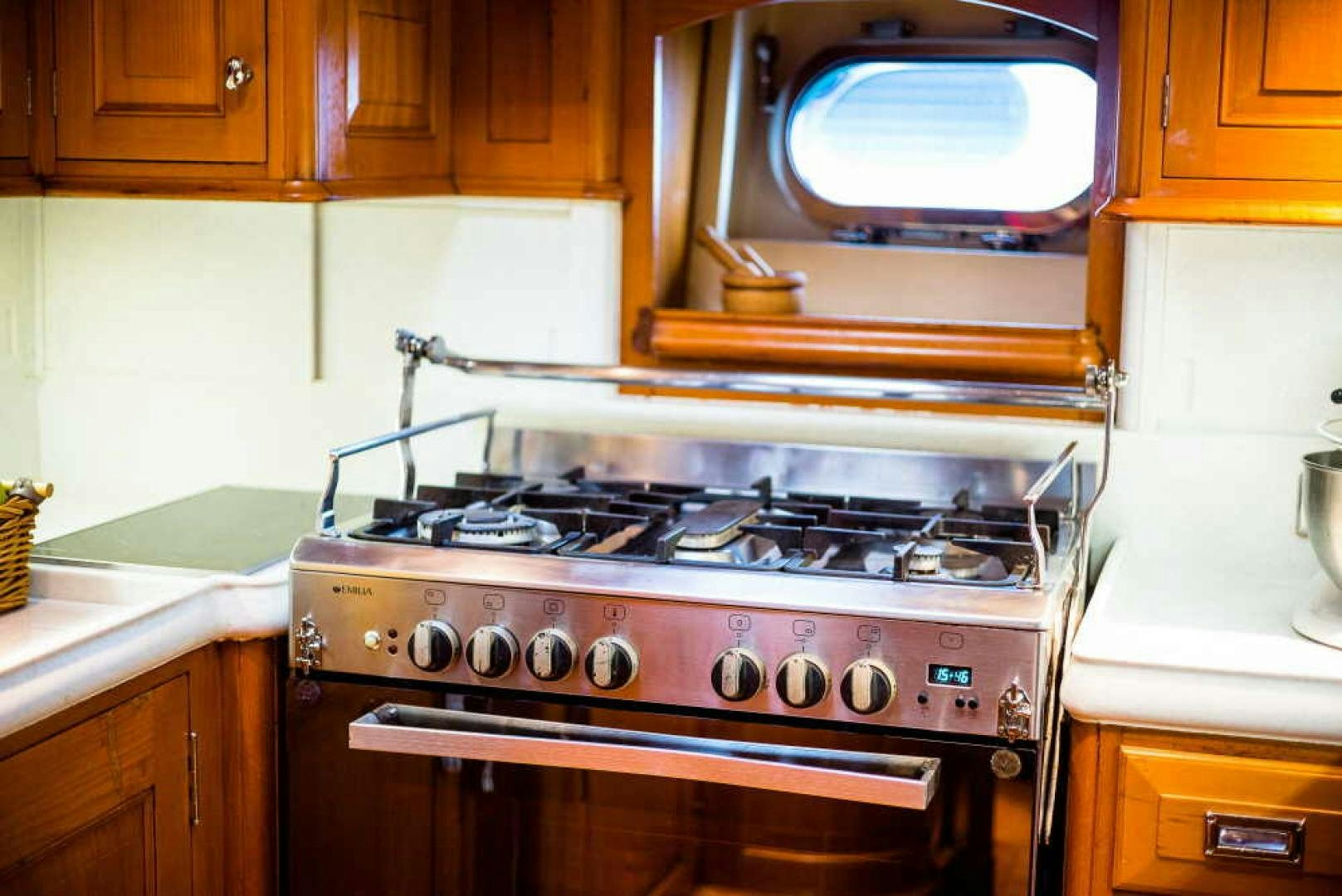 a stove with a microwave above it aboard BLUE TOO Yacht for Sale