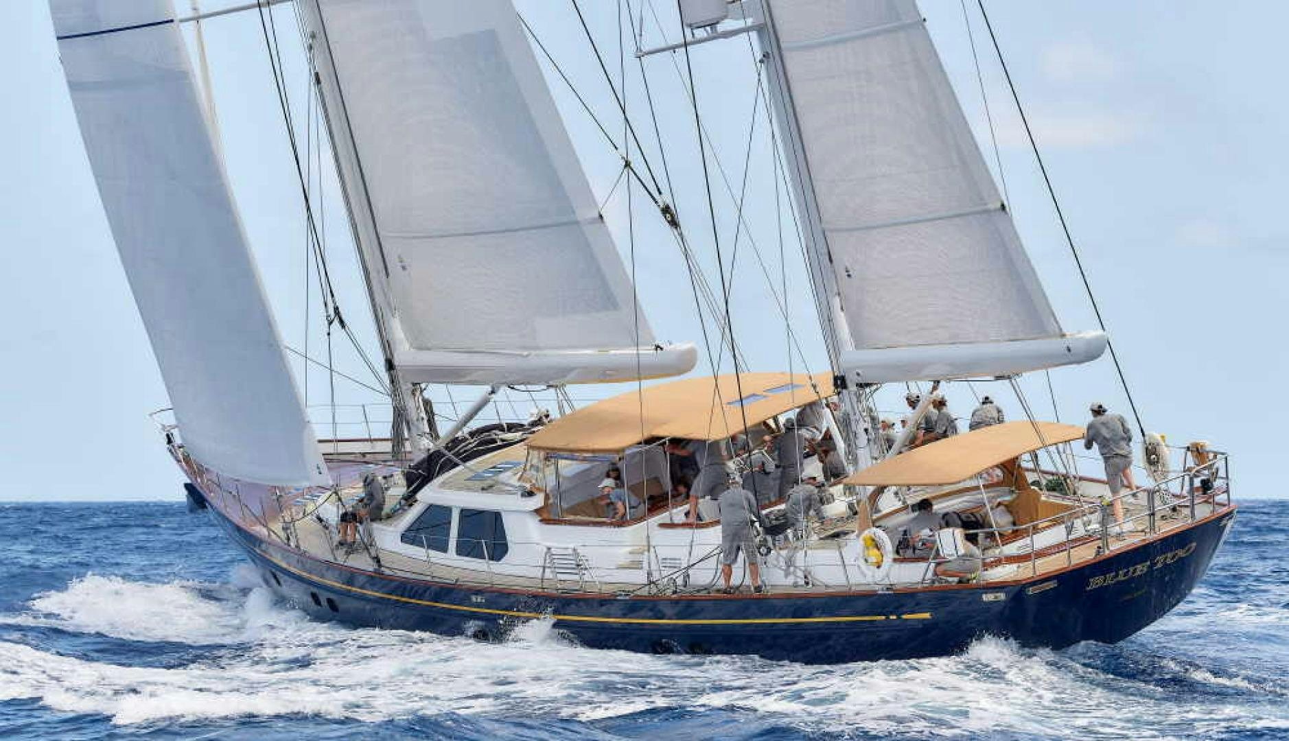 a boat with people on it aboard BLUE TOO Yacht for Sale