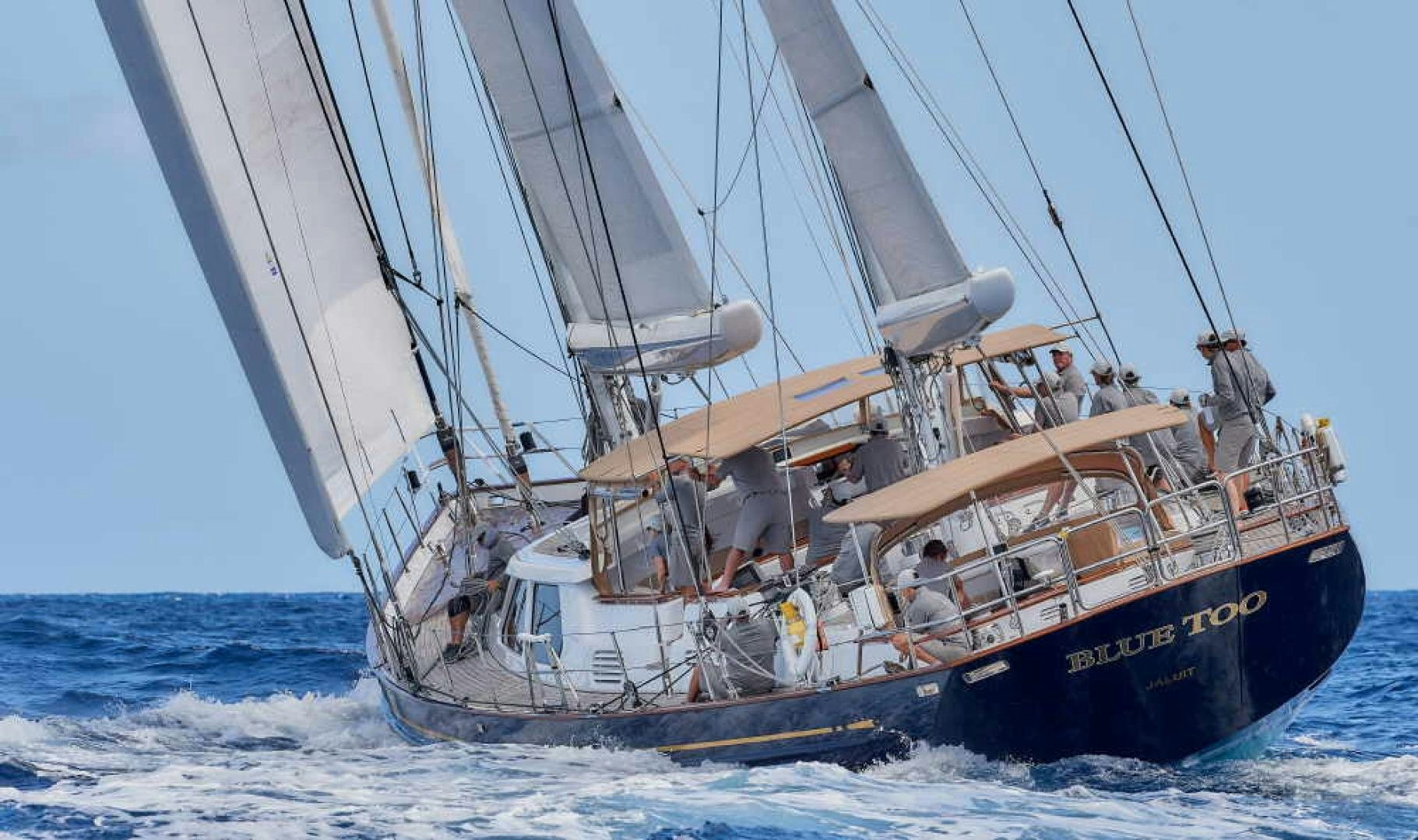 a boat sailing on the sea aboard BLUE TOO Yacht for Sale