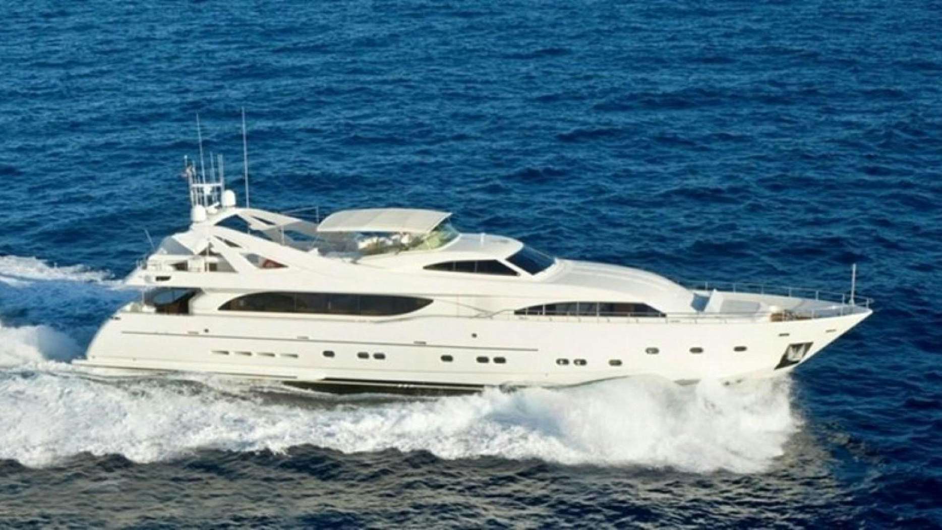 a white yacht in the ocean aboard MAMBO Yacht for Sale