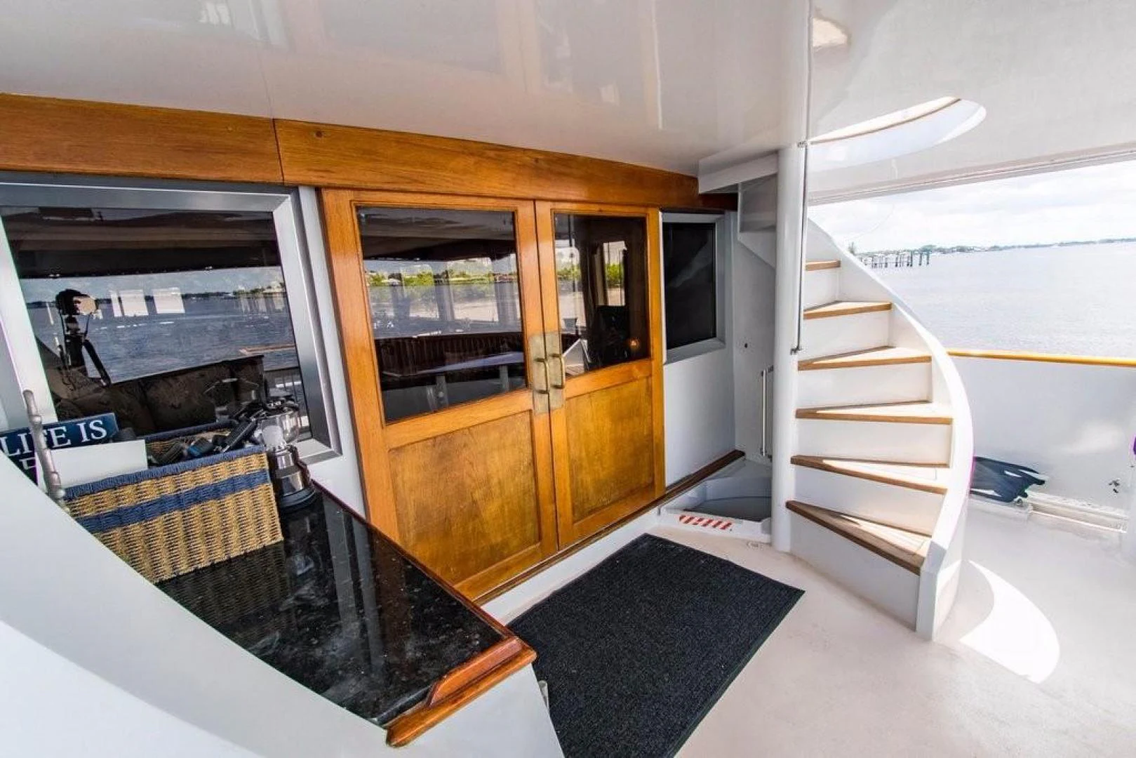 a room with a ladder and a bed aboard TIMELESS Yacht for Sale