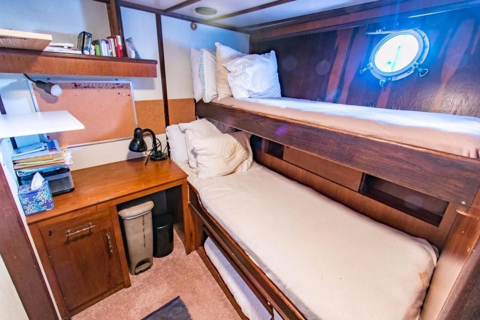 a room with a bed and a desk aboard TIMELESS Yacht for Sale