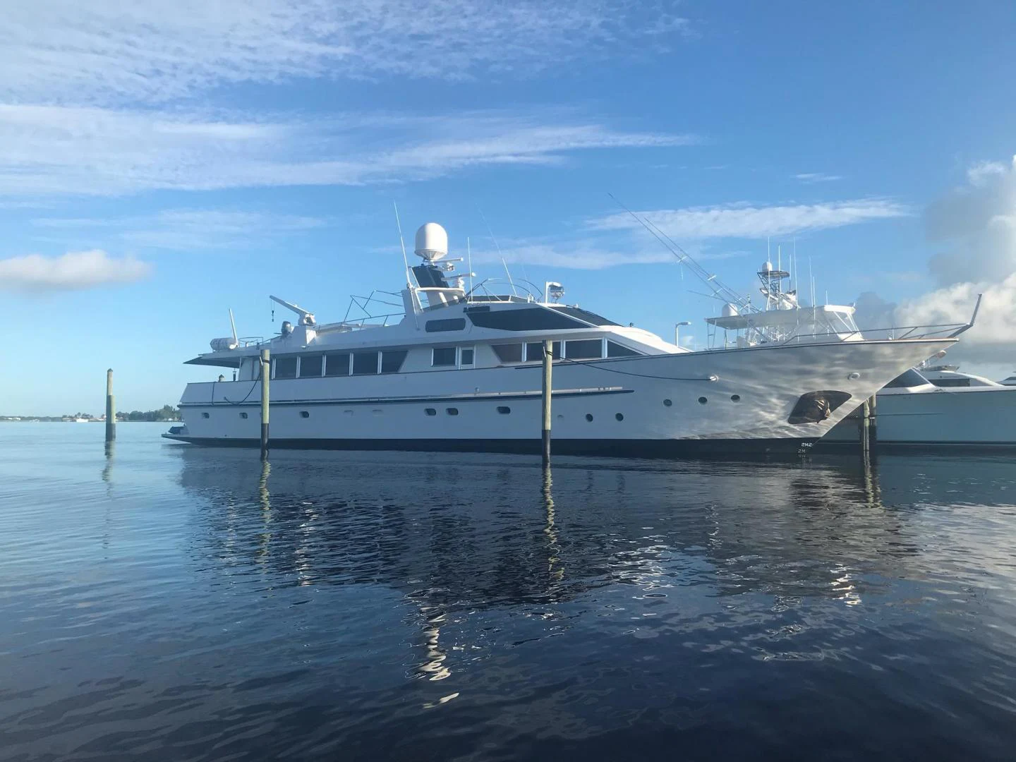 a white boat in the water aboard TIMELESS Yacht for Sale