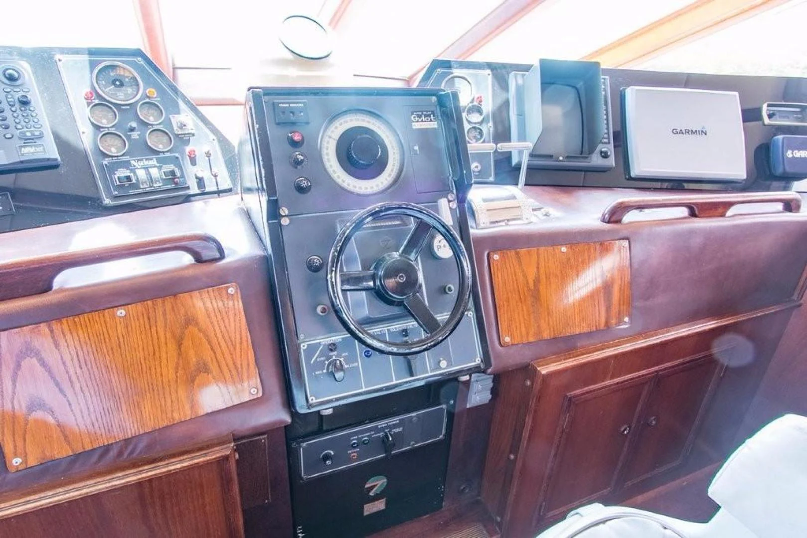 a close-up of a car stereo aboard TIMELESS Yacht for Sale