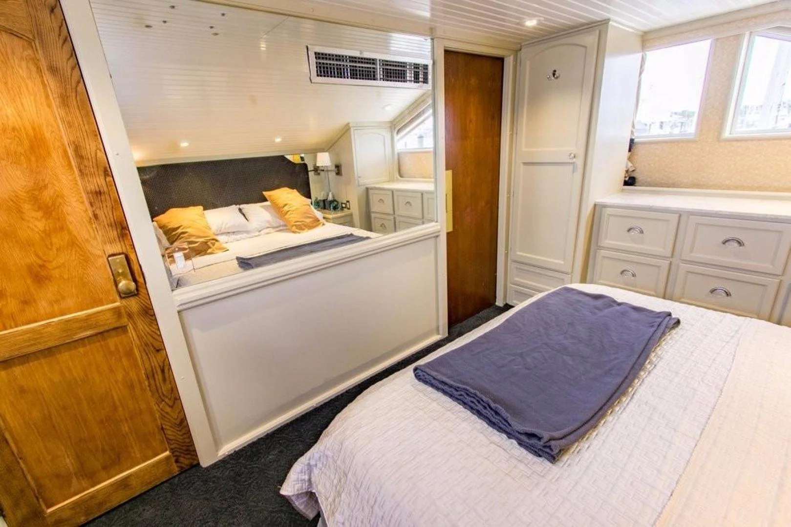 a bedroom with a bed aboard TIMELESS Yacht for Sale