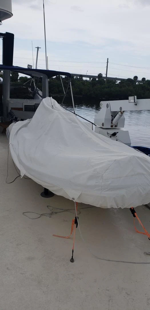 a white tent on a beach aboard TIMELESS Yacht for Sale