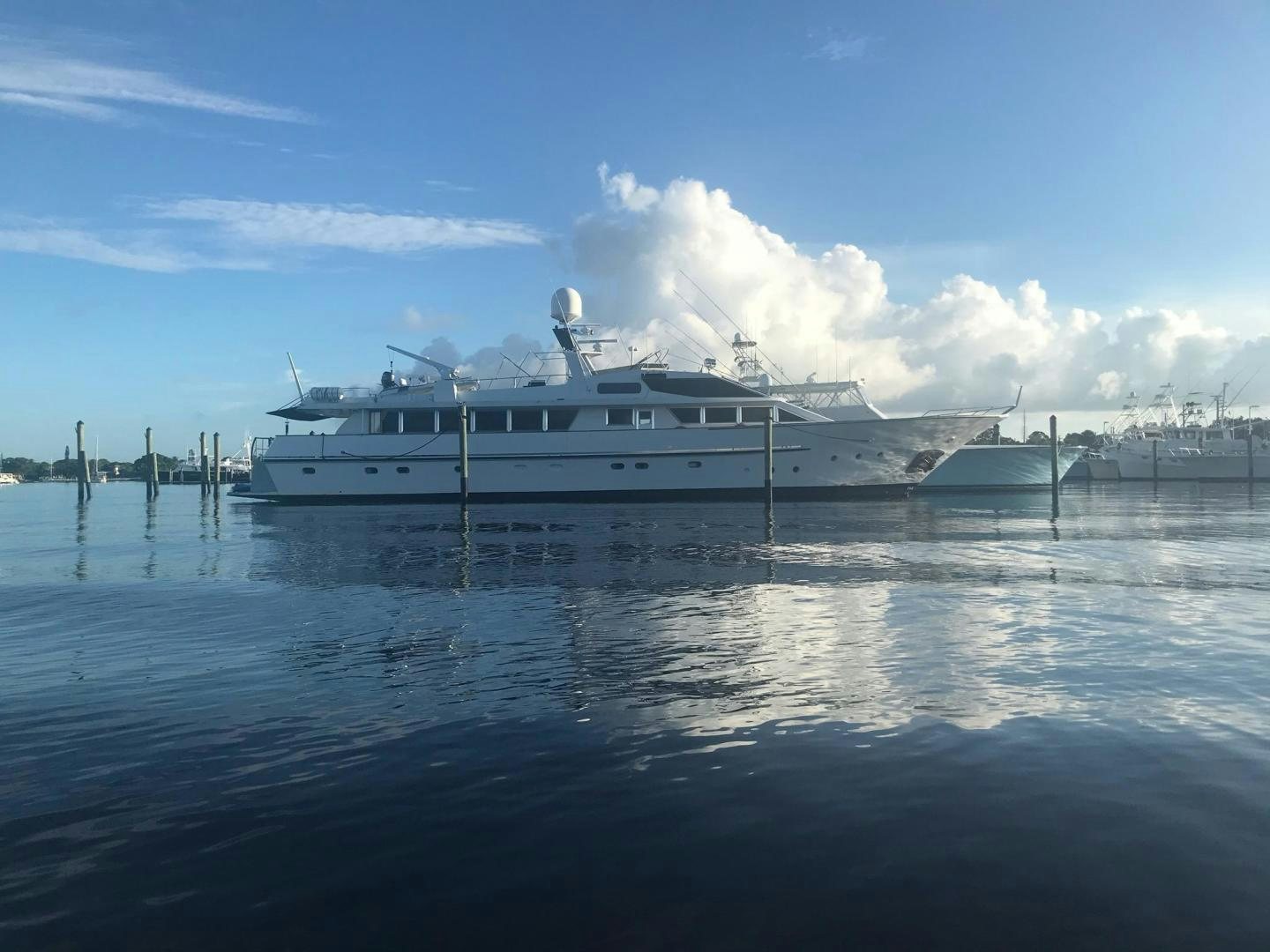 a large white boat on the water aboard TIMELESS Yacht for Sale