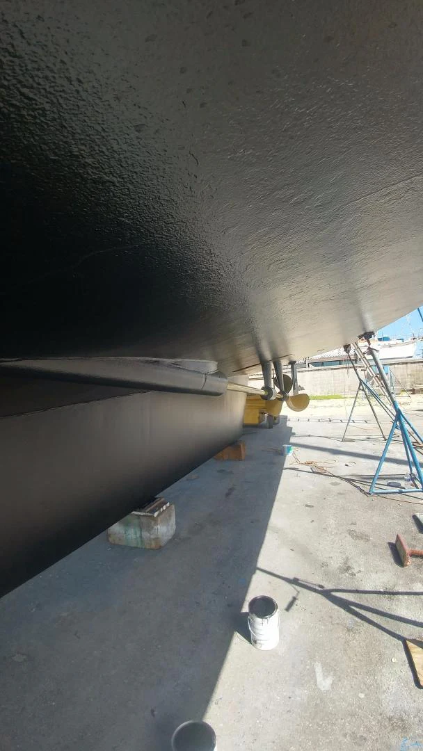 a pipe under a concrete wall aboard TIMELESS Yacht for Sale