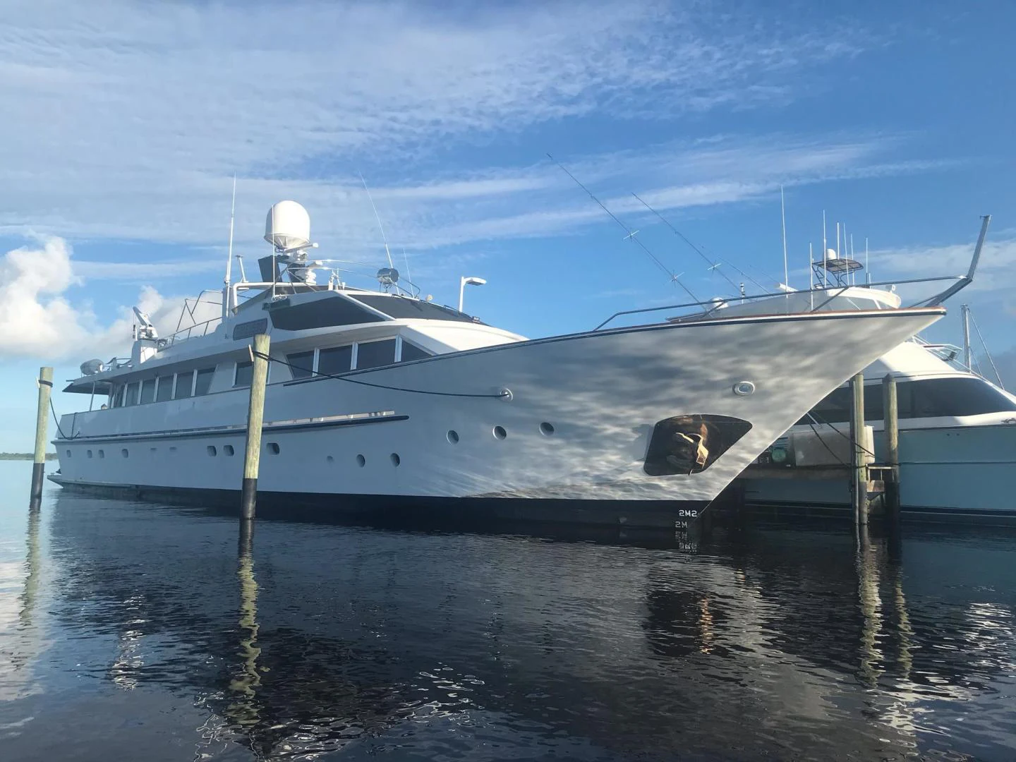a large white boat in the water aboard TIMELESS Yacht for Sale