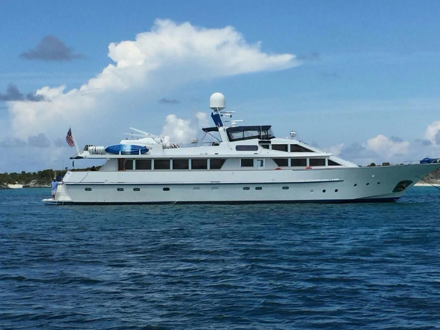 a large white boat in the water aboard TIMELESS Yacht for Sale