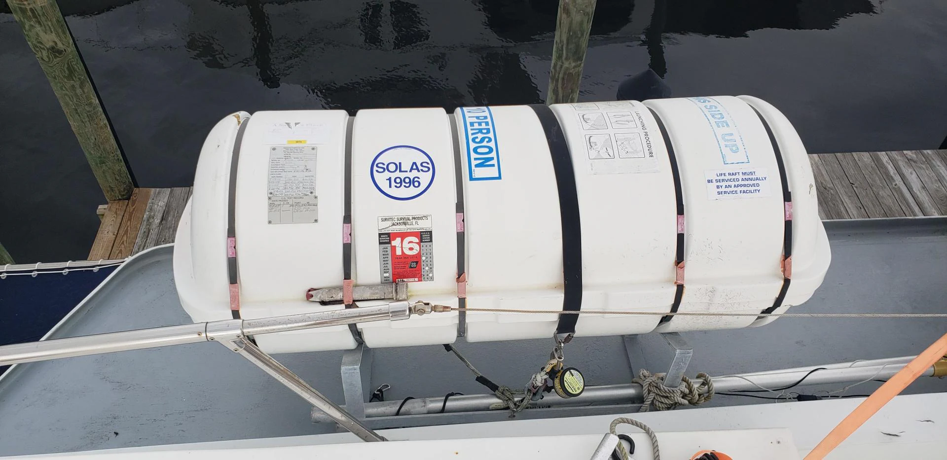 a white boat on a trailer aboard TIMELESS Yacht for Sale