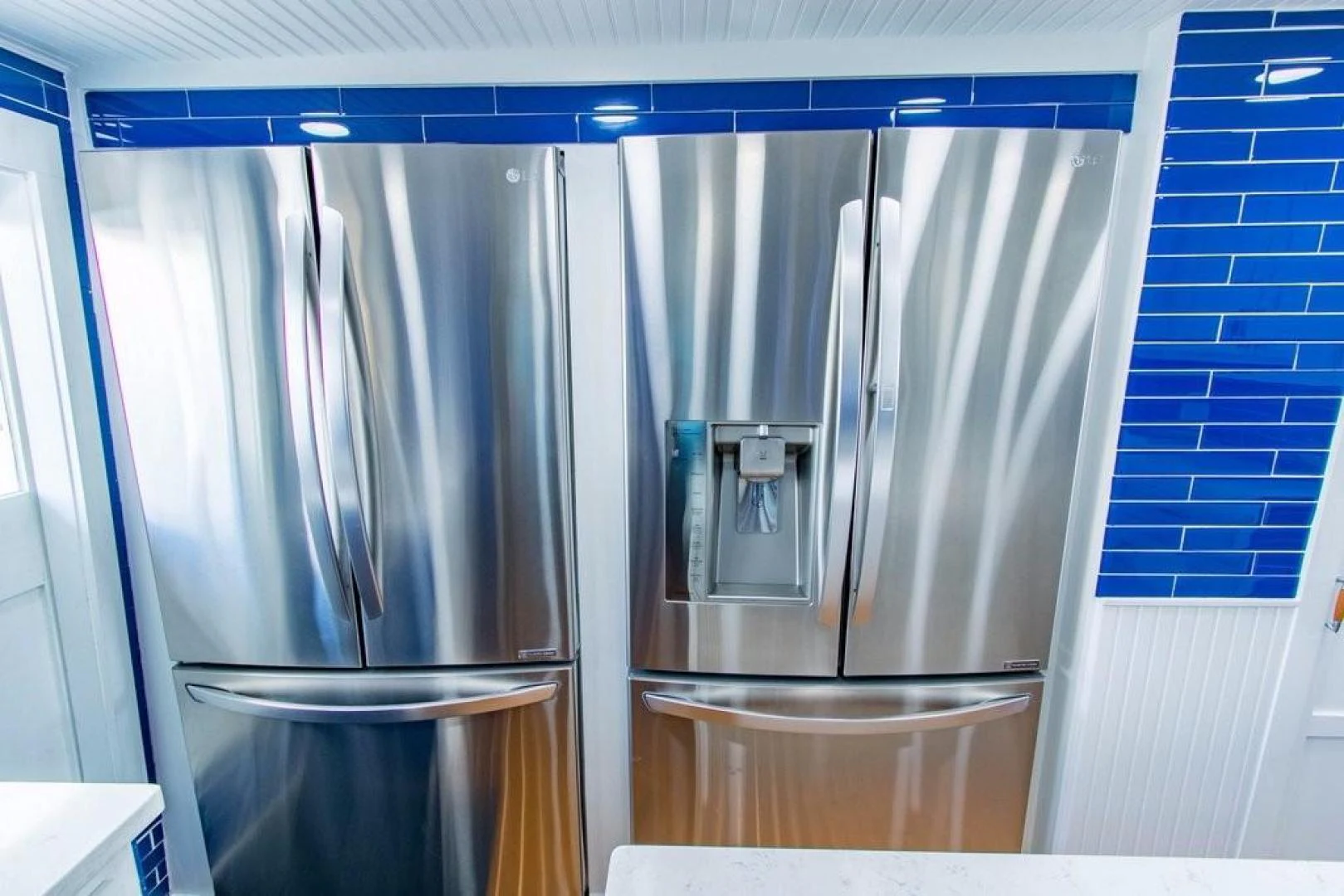 a stainless steel refrigerator in a kitchen aboard TIMELESS Yacht for Sale