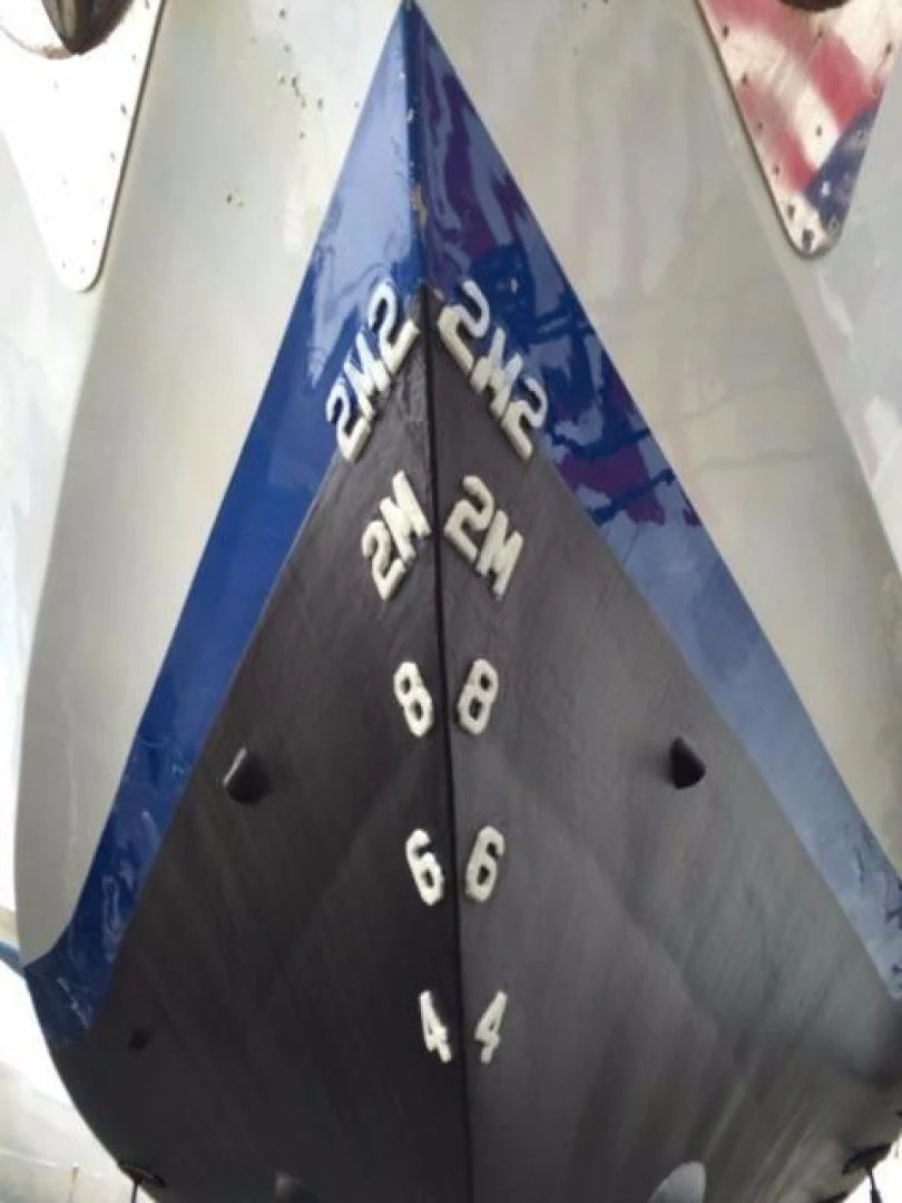 a close-up of a blue and white tie aboard TIMELESS Yacht for Sale