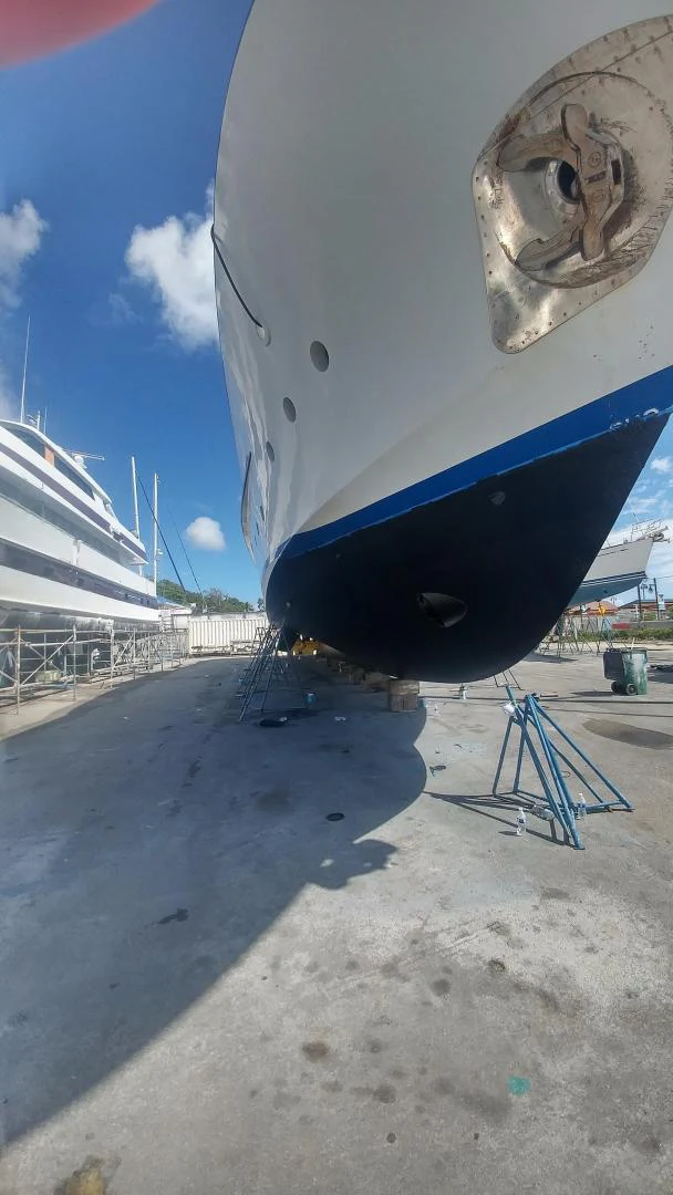 a large blue and black airplane aboard TIMELESS Yacht for Sale