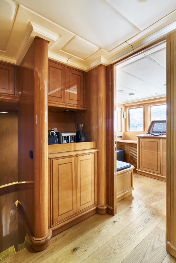 a wooden cabinet in a kitchen aboard OLDE SALT Yacht for Sale
