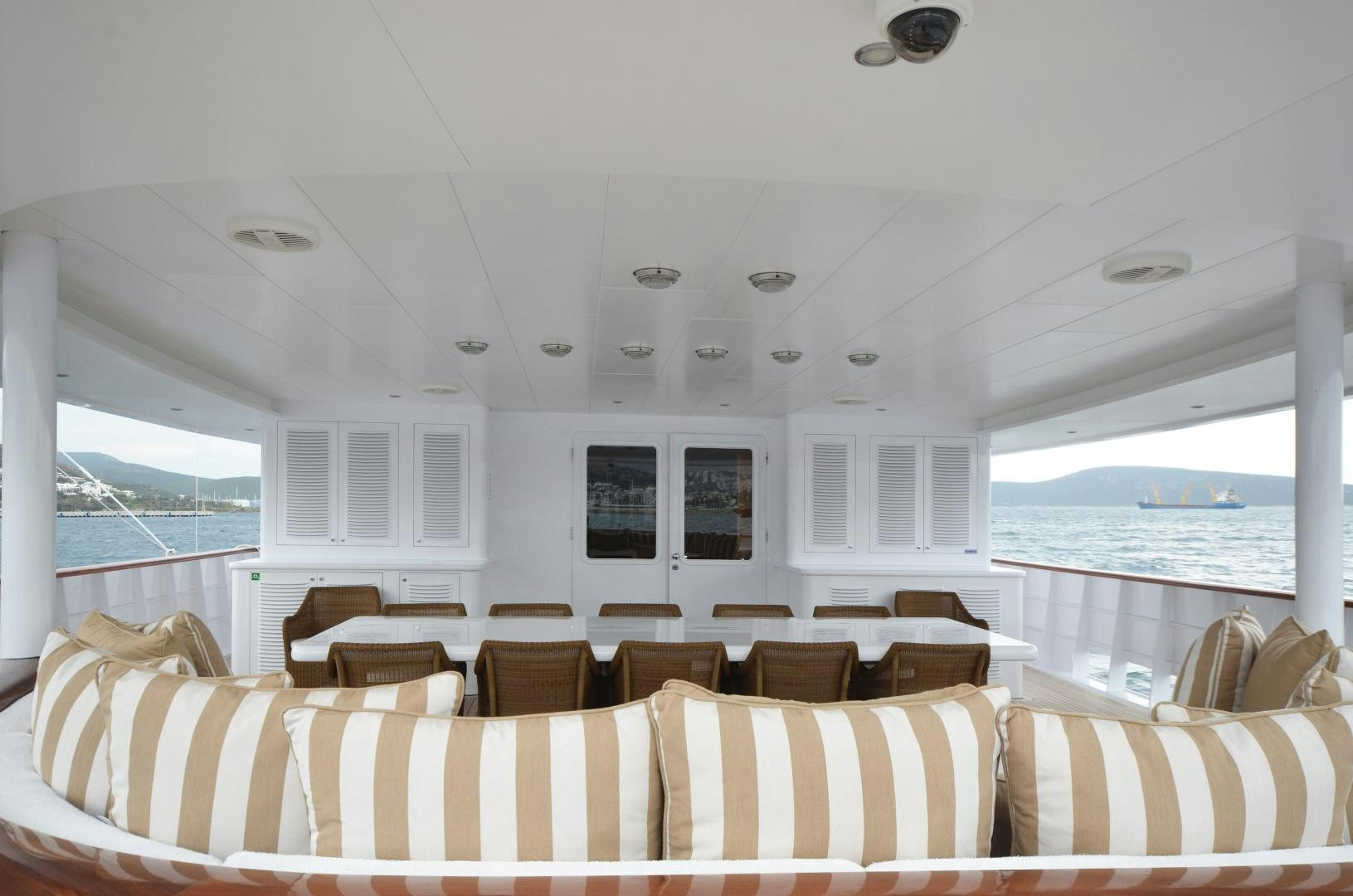a living room with a large window aboard OLDE SALT Yacht for Sale