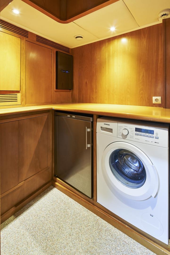 a washing machine in a kitchen aboard OLDE SALT Yacht for Sale