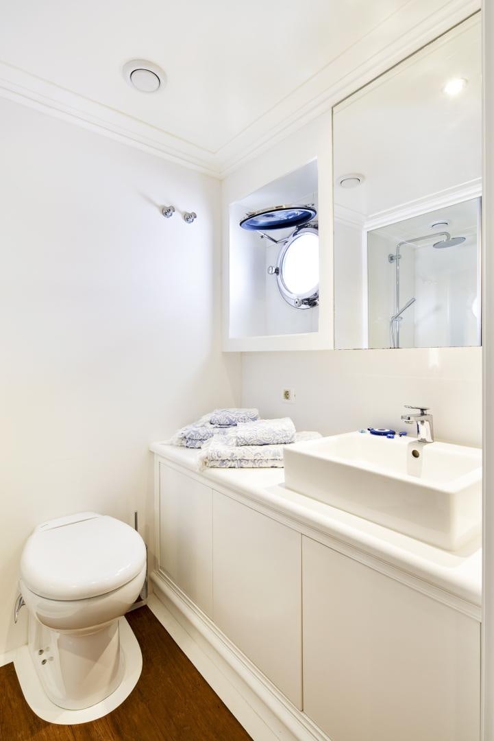 a bathroom with a sink and a toilet aboard OLDE SALT Yacht for Sale