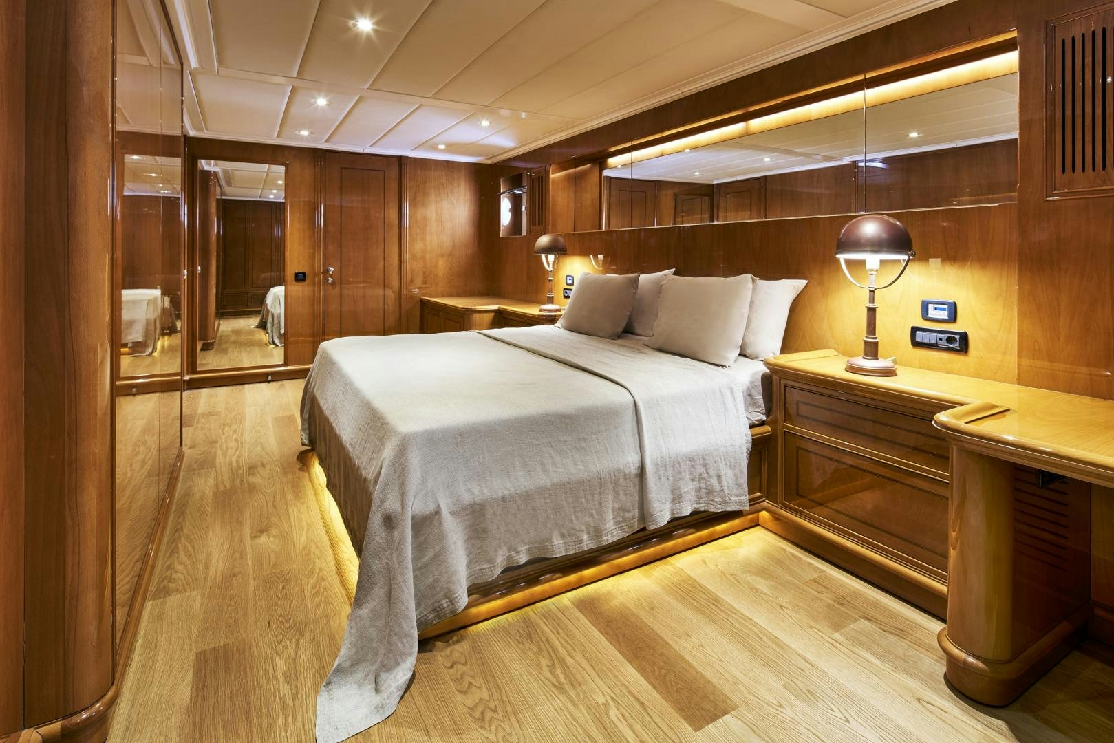 a room with a bed and a desk aboard OLDE SALT Yacht for Sale
