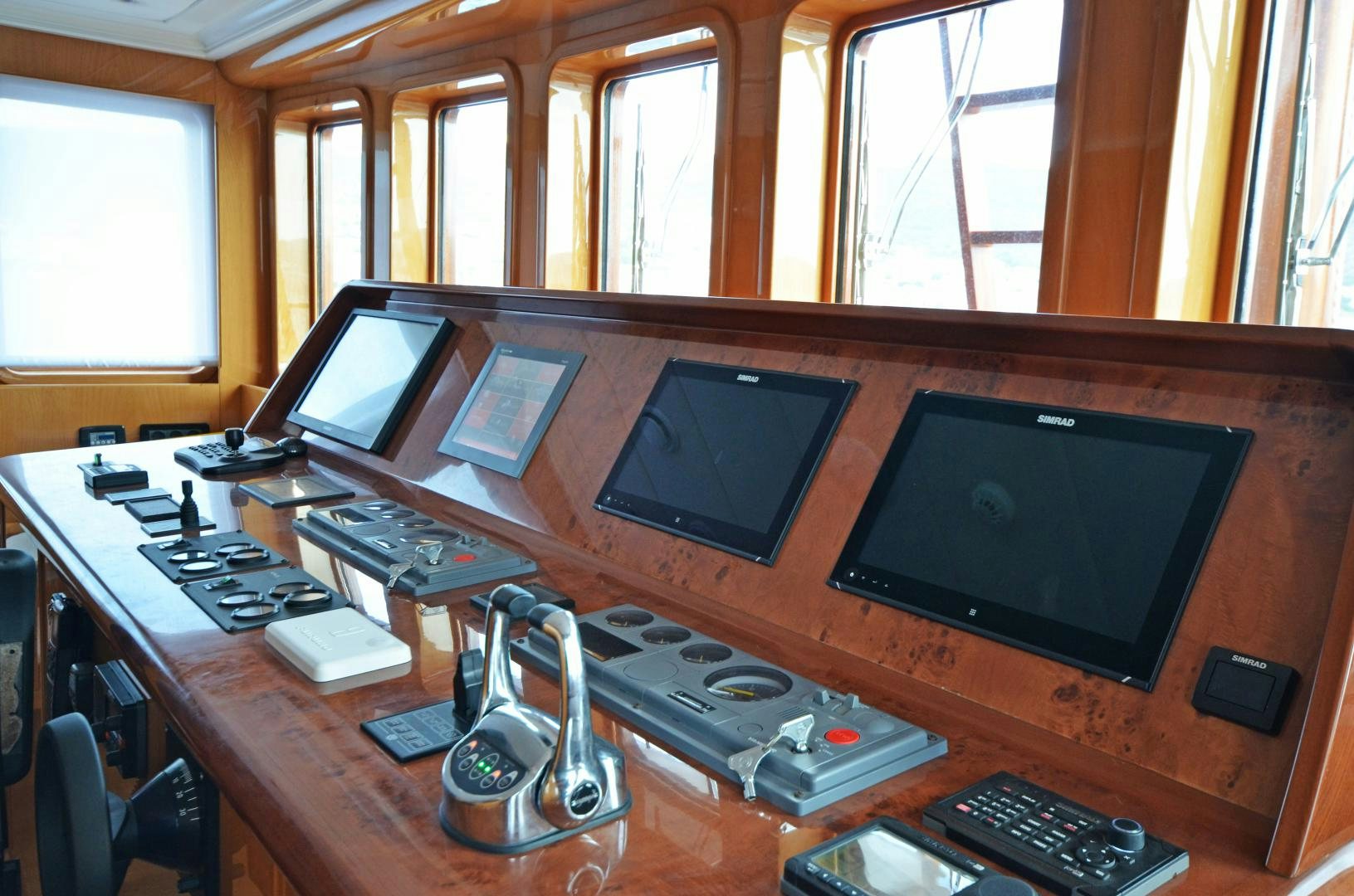 a desk with a laptop and a television on it aboard OLDE SALT Yacht for Sale