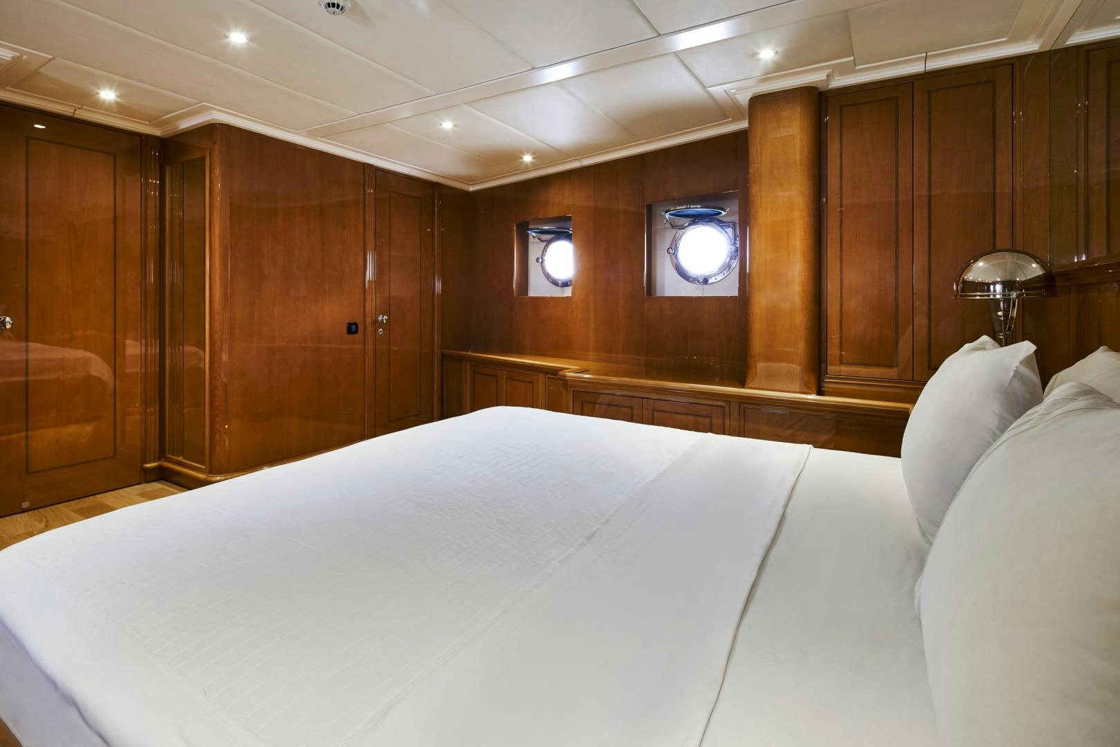 a room with a bed and a television aboard OLDE SALT Yacht for Sale