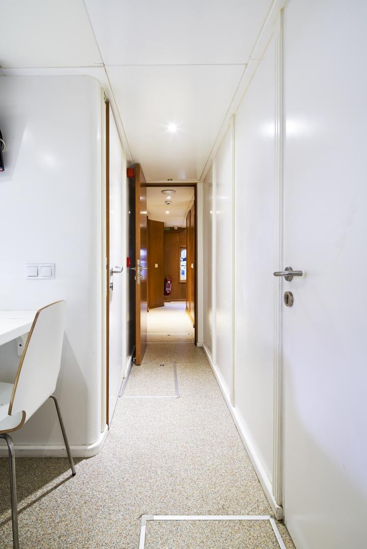 a hallway with doors aboard OLDE SALT Yacht for Sale