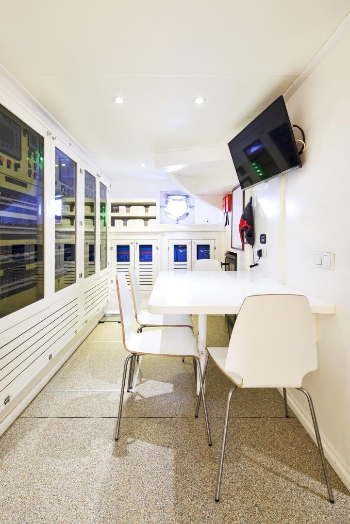 a room with a table and chairs aboard OLDE SALT Yacht for Sale