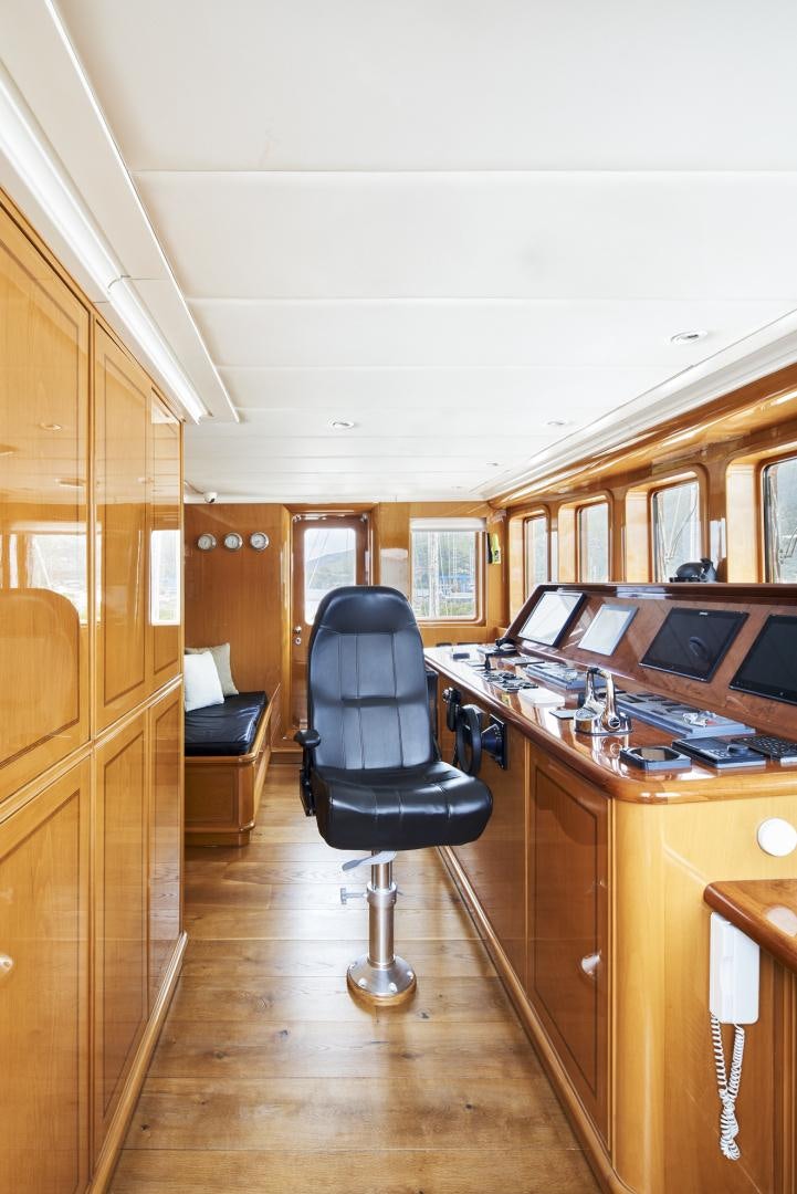a room with a desk and chairs aboard OLDE SALT Yacht for Sale