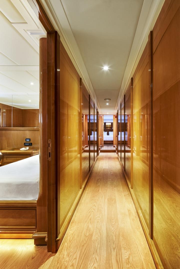 a long hallway with wood floors aboard OLDE SALT Yacht for Sale