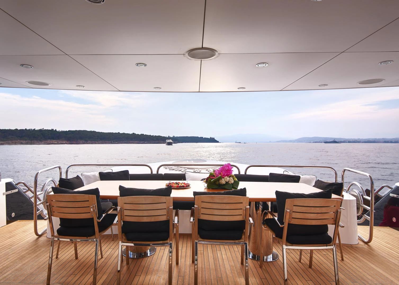 a table set for a dinner party aboard BLACK AND WHITE Yacht for Sale