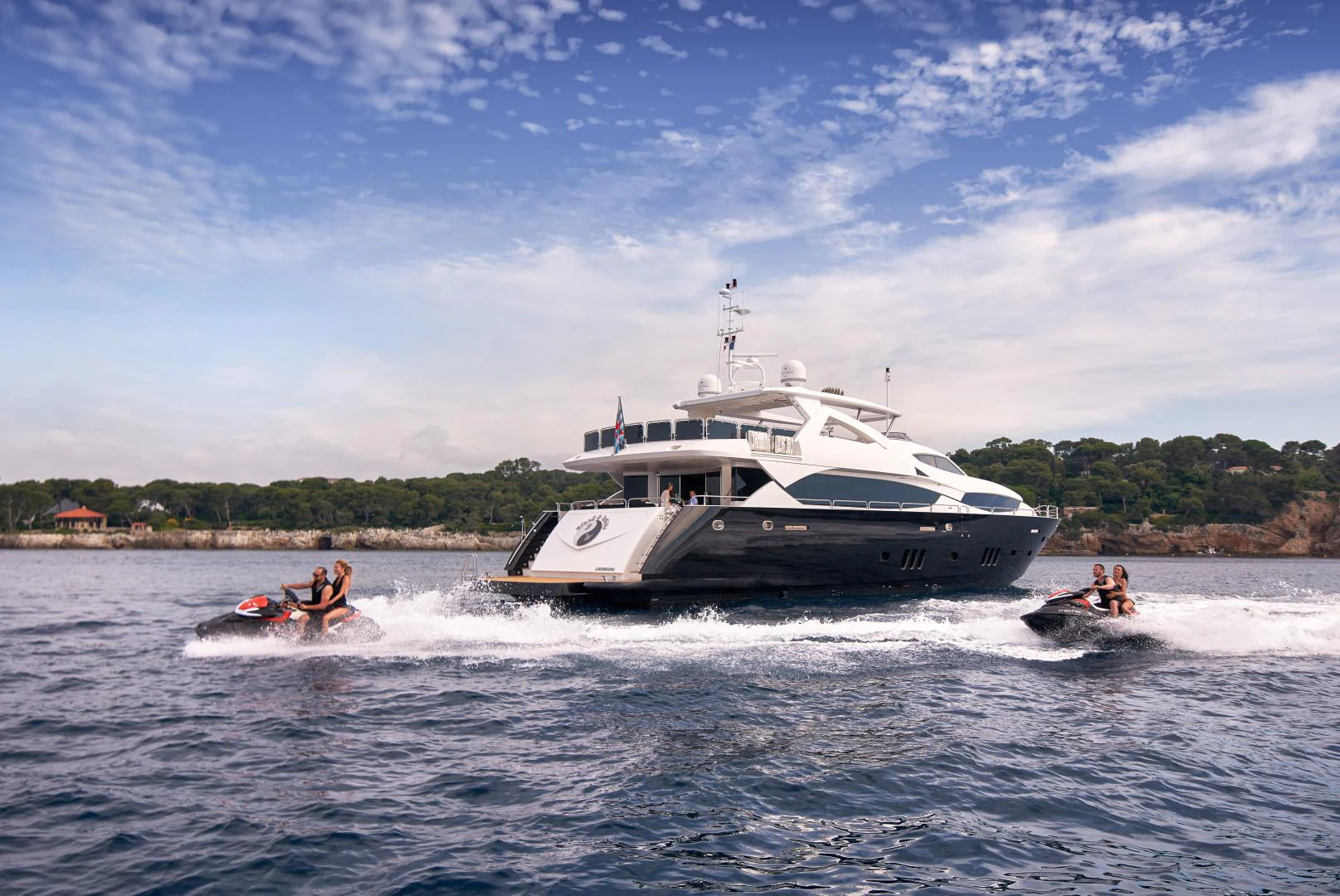 a boat on the water aboard BLACK AND WHITE Yacht for Sale