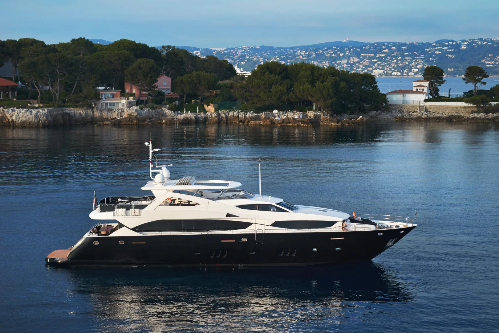a boat on the water aboard BLACK AND WHITE Yacht for Sale