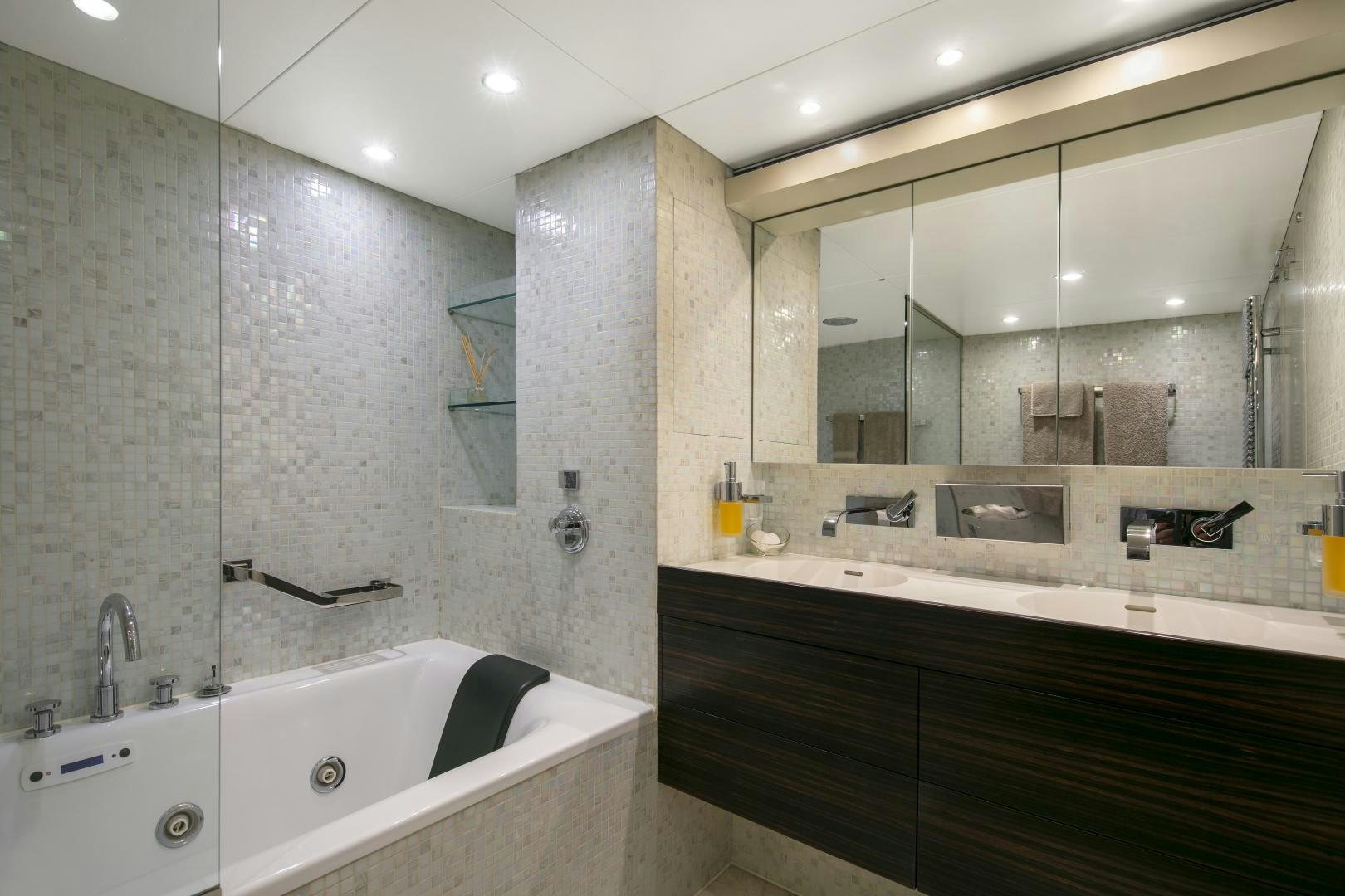 a bathroom with a large mirror aboard Y42 Yacht for Sale