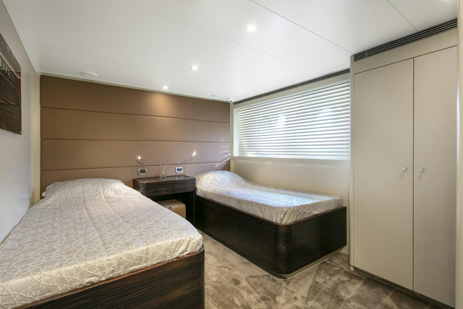 a room with two beds aboard Y42 Yacht for Sale