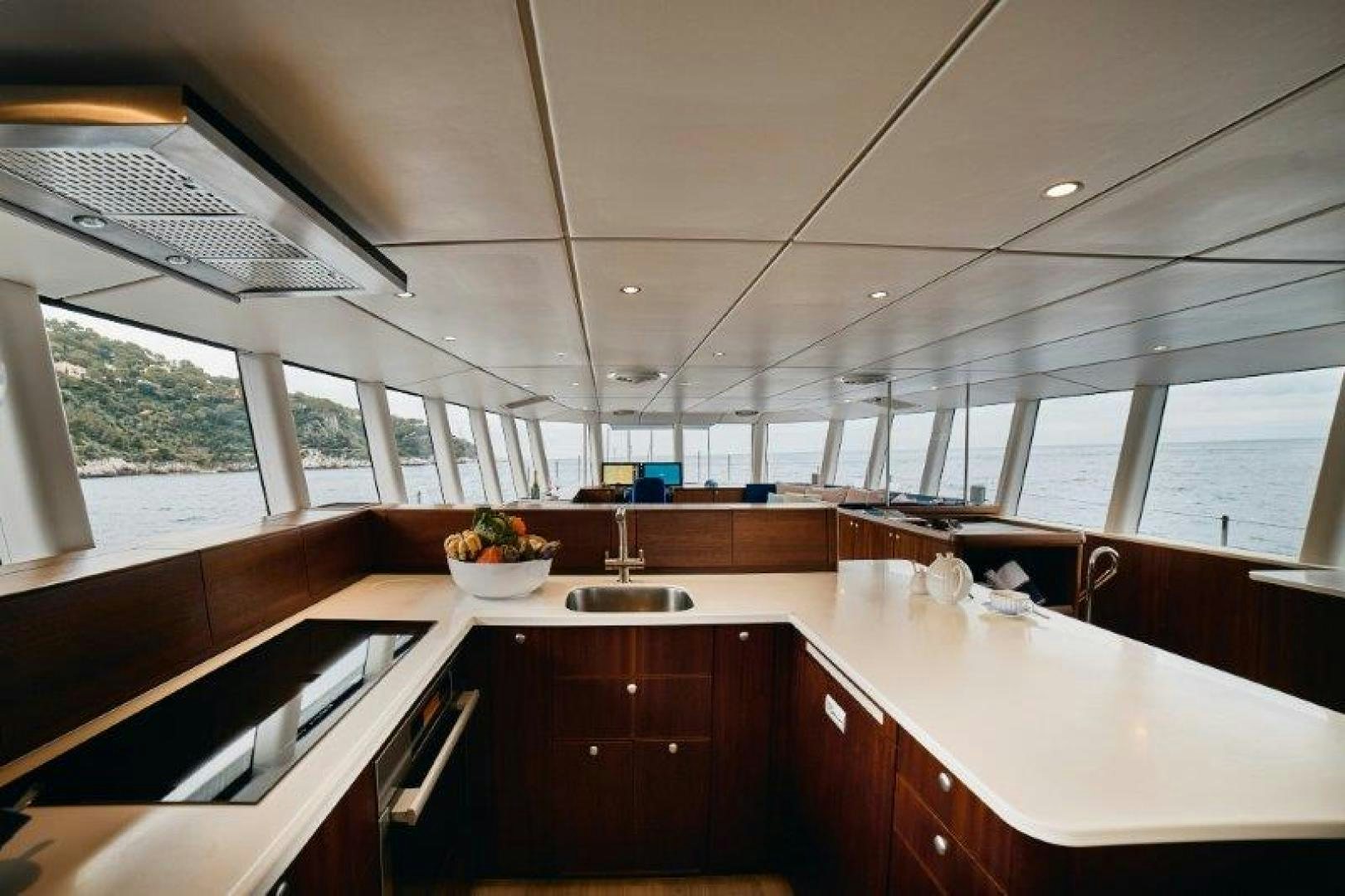 a kitchen with a large window aboard ICEBERG Yacht for Sale