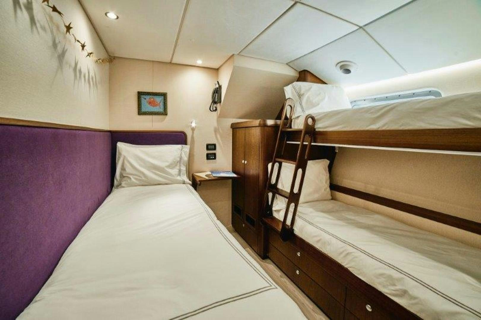 a room with bunk beds aboard ICEBERG Yacht for Sale