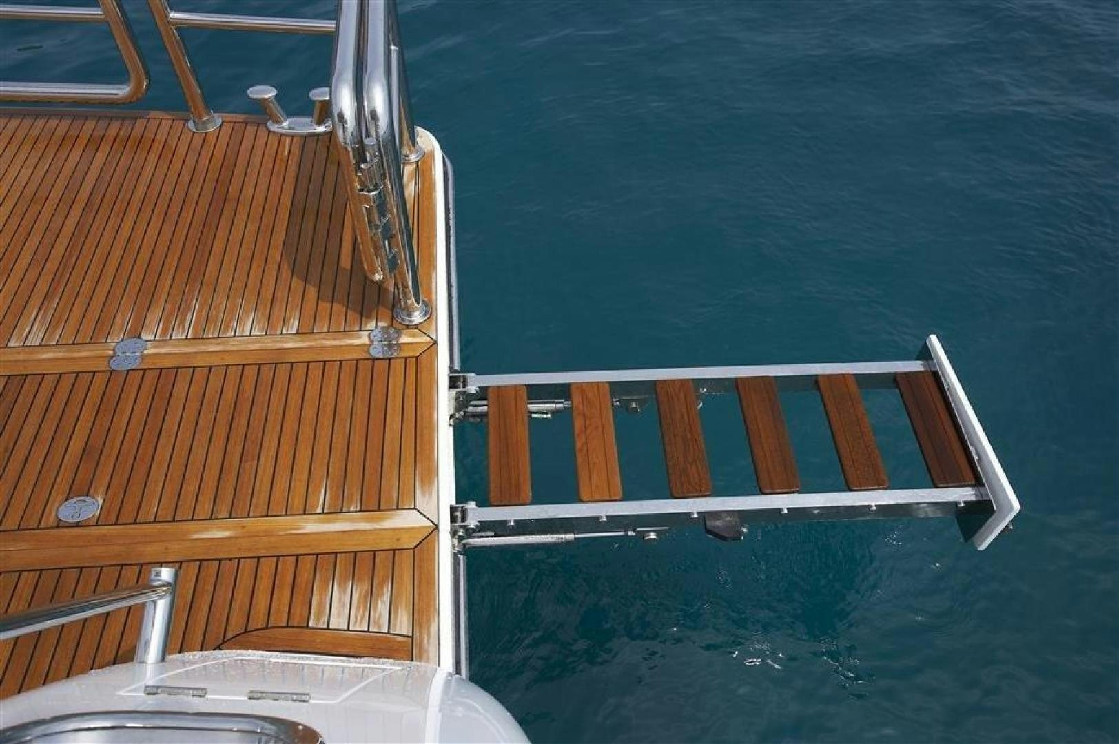 a boat on the water aboard JOHNSON 110 FLYBRIDGE Yacht for Charter