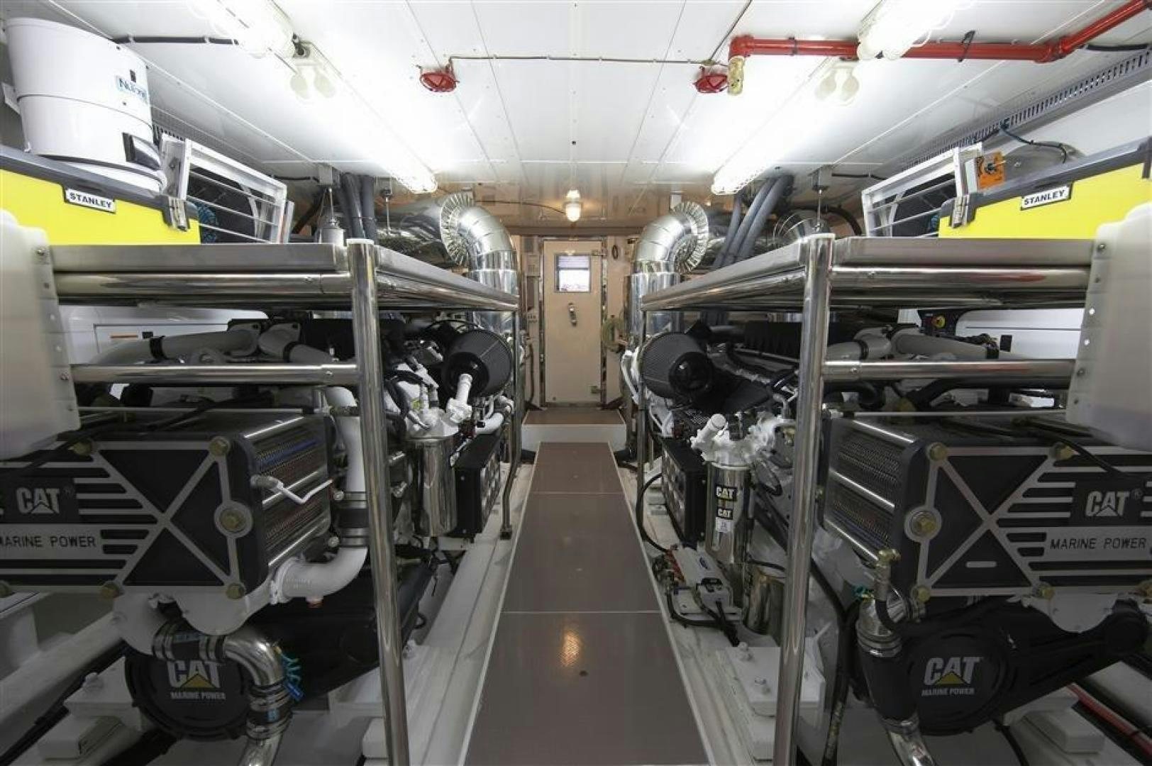 a large room with machinery aboard JOHNSON 110 FLYBRIDGE Yacht for Charter