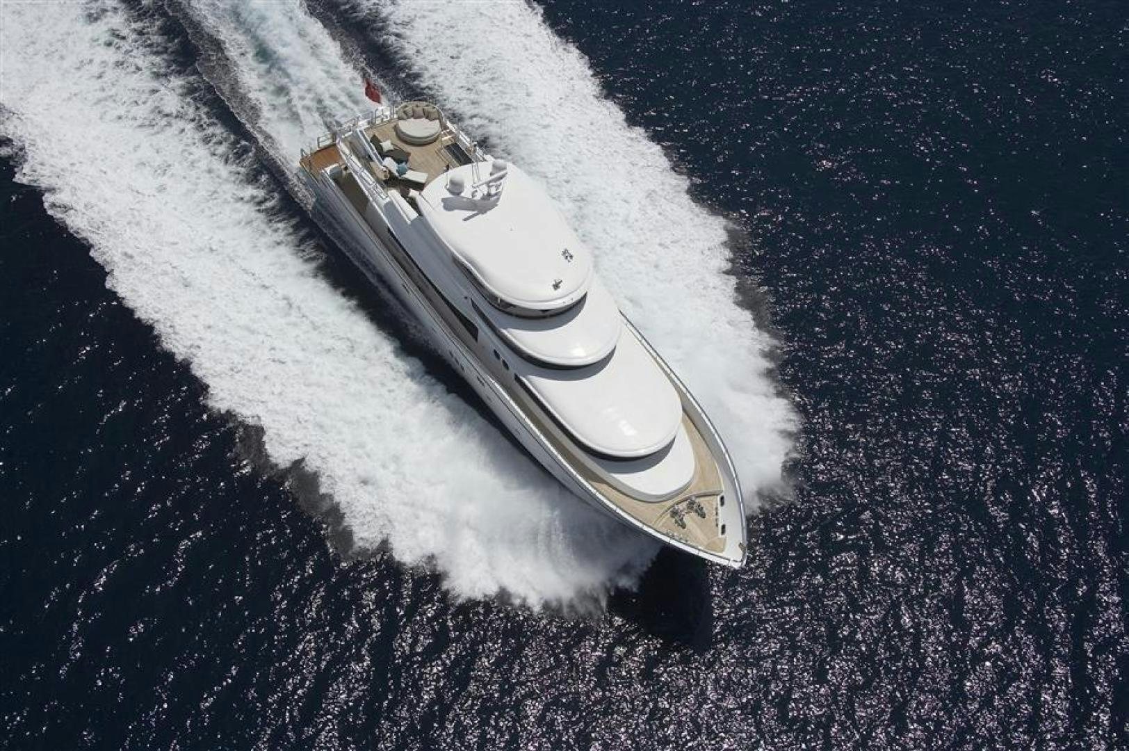 a white cell phone on a black surface aboard JOHNSON 110 FLYBRIDGE Yacht for Charter