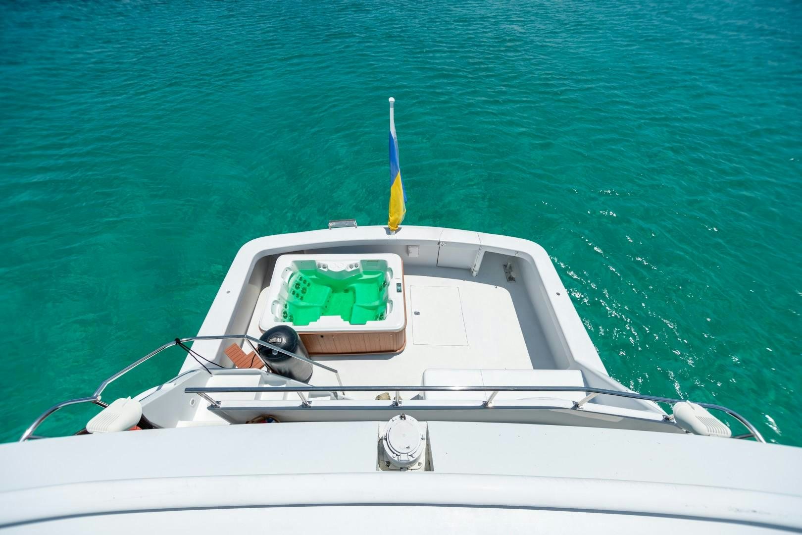 a boat with a person in it aboard ISLAND TIME Yacht for Sale
