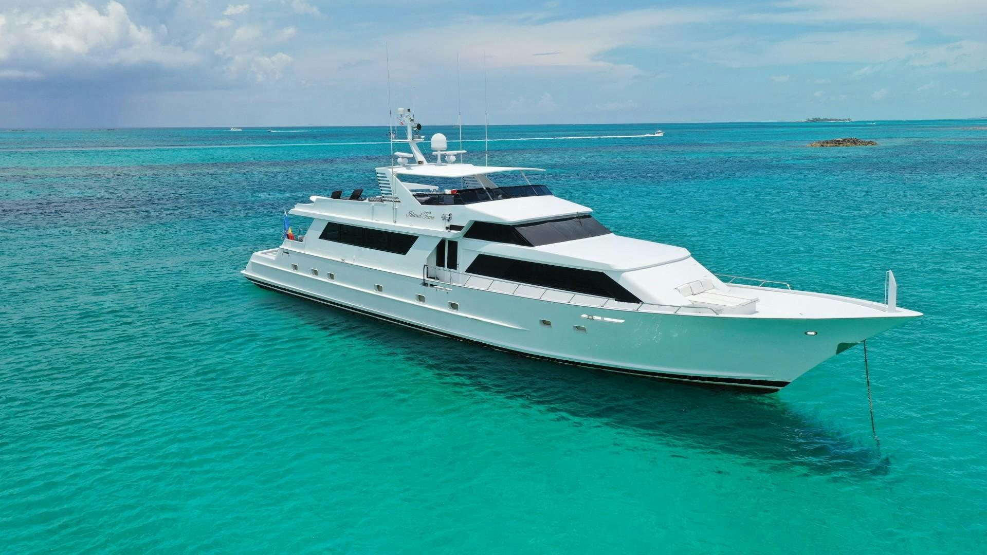 a white boat in the water aboard ISLAND TIME Yacht for Sale